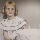 Connie Harris age 7 in a dress made by Grandma Minnie Elizabeth Sutton Harris (1910-2004)