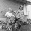 Anne and Sue on bicycles circa 1963