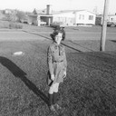 Brownie from the Elf Six posing in front yard of 96 Churchill Road Baie dUrfe