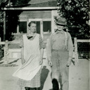 Lewis William & Sarah Elizabeth Nilsson Jones in front of the old homestead, Monroe, Sevier, Utah