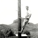 Fred Burk on telephone pole