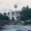 A photo of Po'Lady's beachhouse, taken many years after she last lived there. The shore is now deeply eroded. But the water tower in the background was always a landmark we looked for when we were nearing the end of our journey and almost there. The upstairs porch was a sleeping porch, where cousins often pulled cots out onto the porch and feel asleep to the sound of the gentle waves of Santa Rosa Sound. It was an amazing place to spend the summer at. We were so very lucky to have this place in our lives.