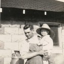 Eldon with Dad in Front of Milk House