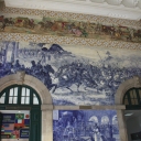The walls of the Porto Train Station are covered with pictures made from tiles.