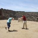 Merina and Nathaniel demonstrating a bull fight.  This is one of the oldest bull fighting rings in Portugal.  To the right, and just outside the ring is the bull pens.